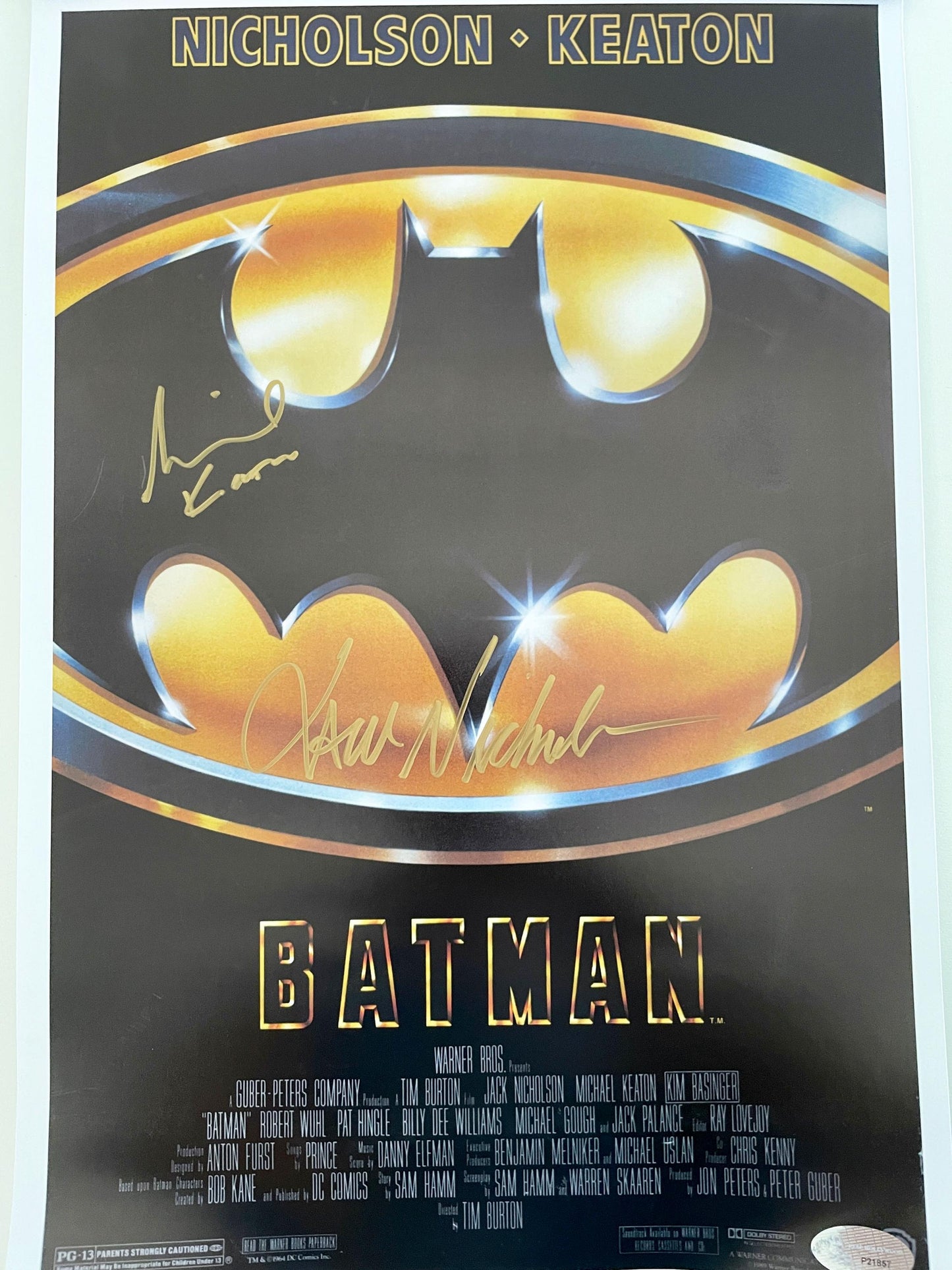 a batman movie poster with a batman symbol