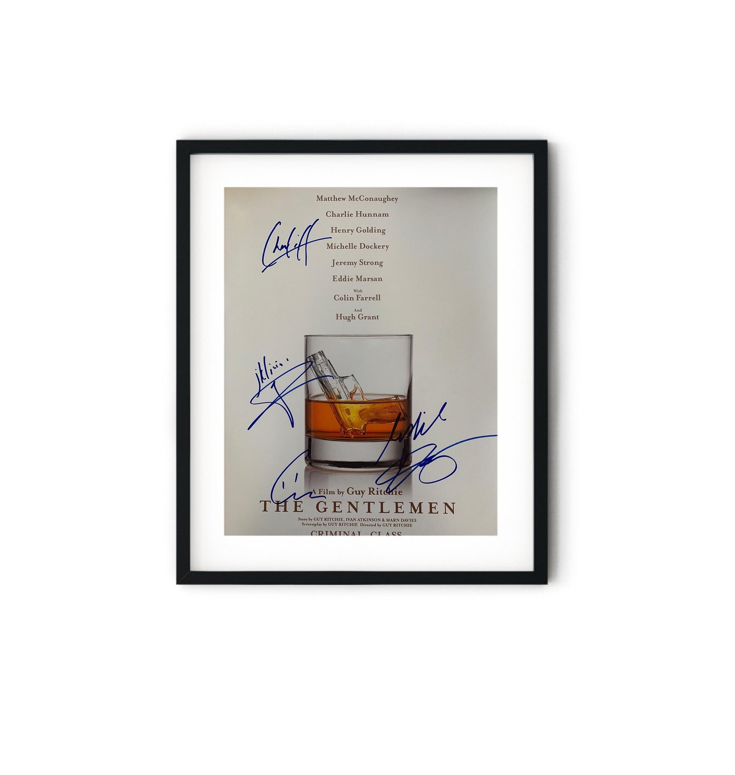 a signed poster of a glass of whiskey