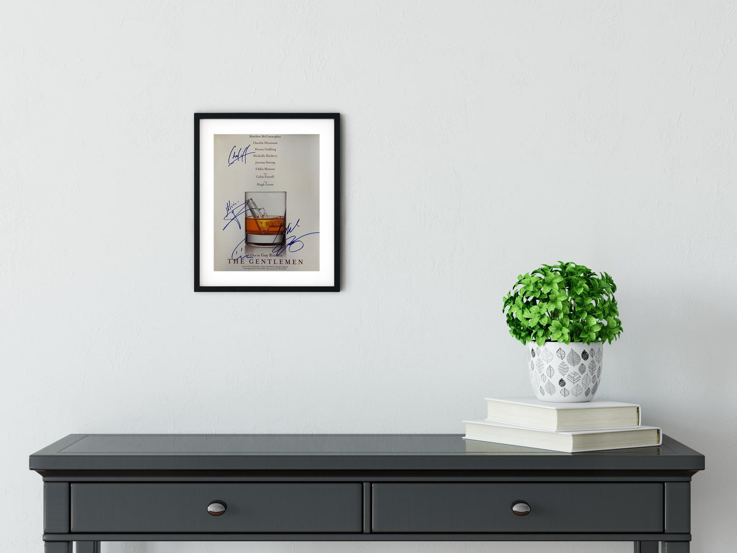 a table with a potted plant on top of it